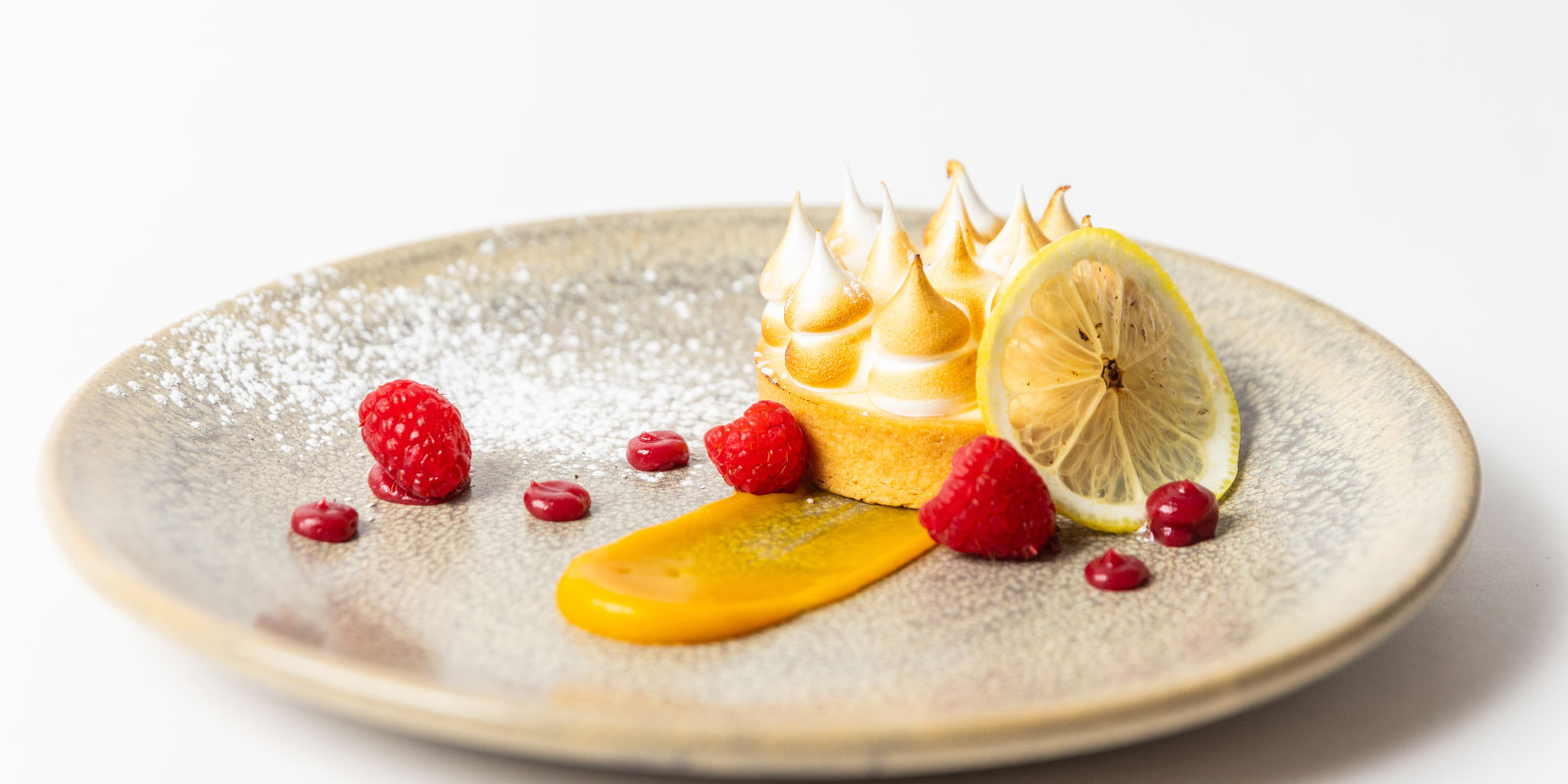 A specialty dessert with fruit.